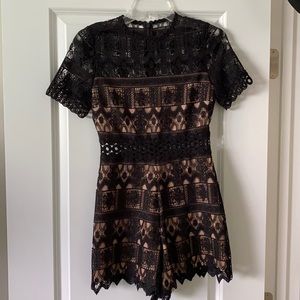 NWT Alexis black and nude lace romper XS